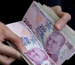 Turkish lira collapses to historic lows after rate cut by Erdogan's order
