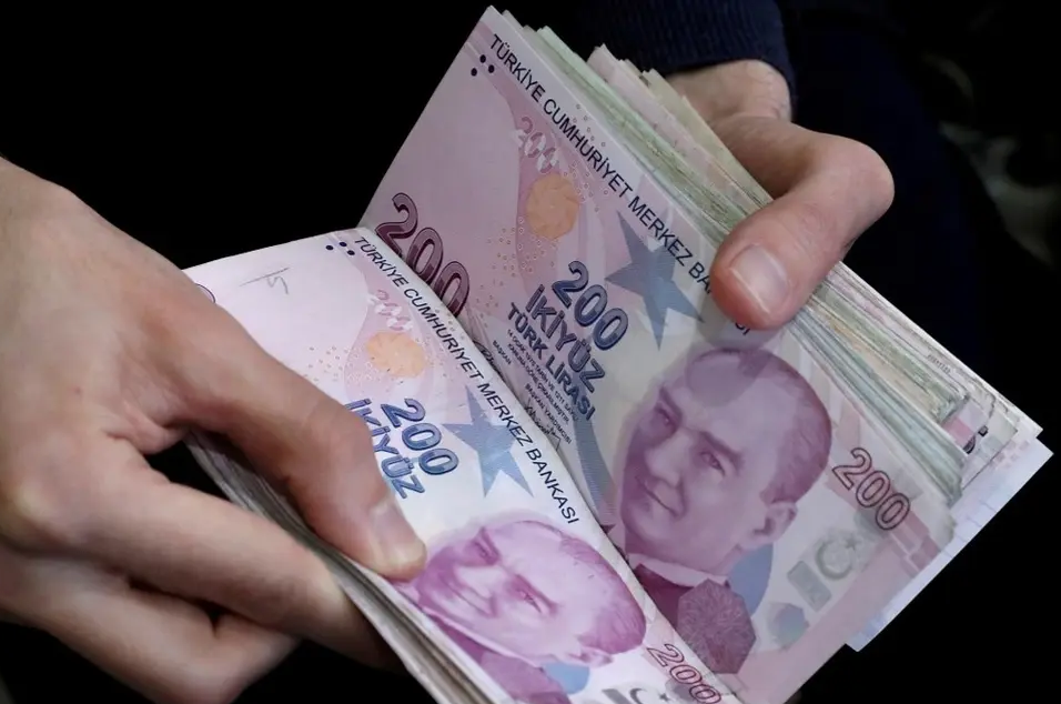 Turkish lira collapses to historic lows after rate cut by Erdogan's order